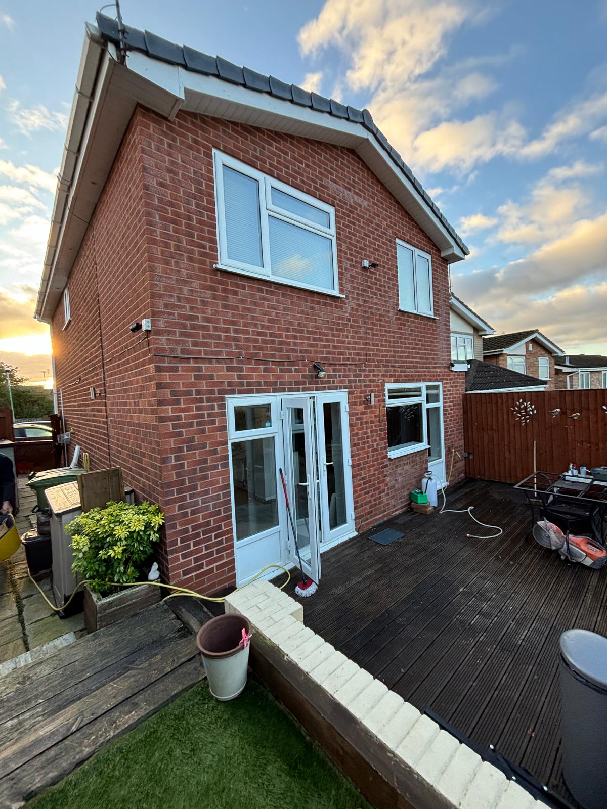Rear exterior view of home extension project by Project Managed Kitchens